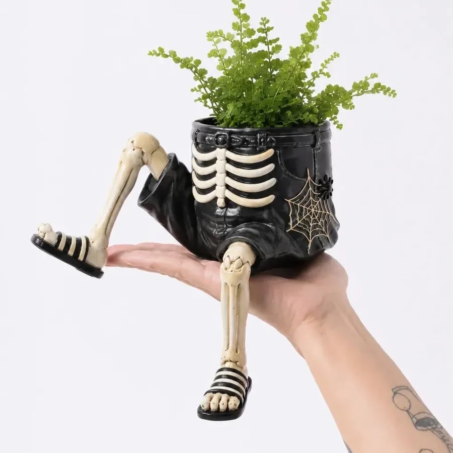 Skeleton leg Halloween planter with plant