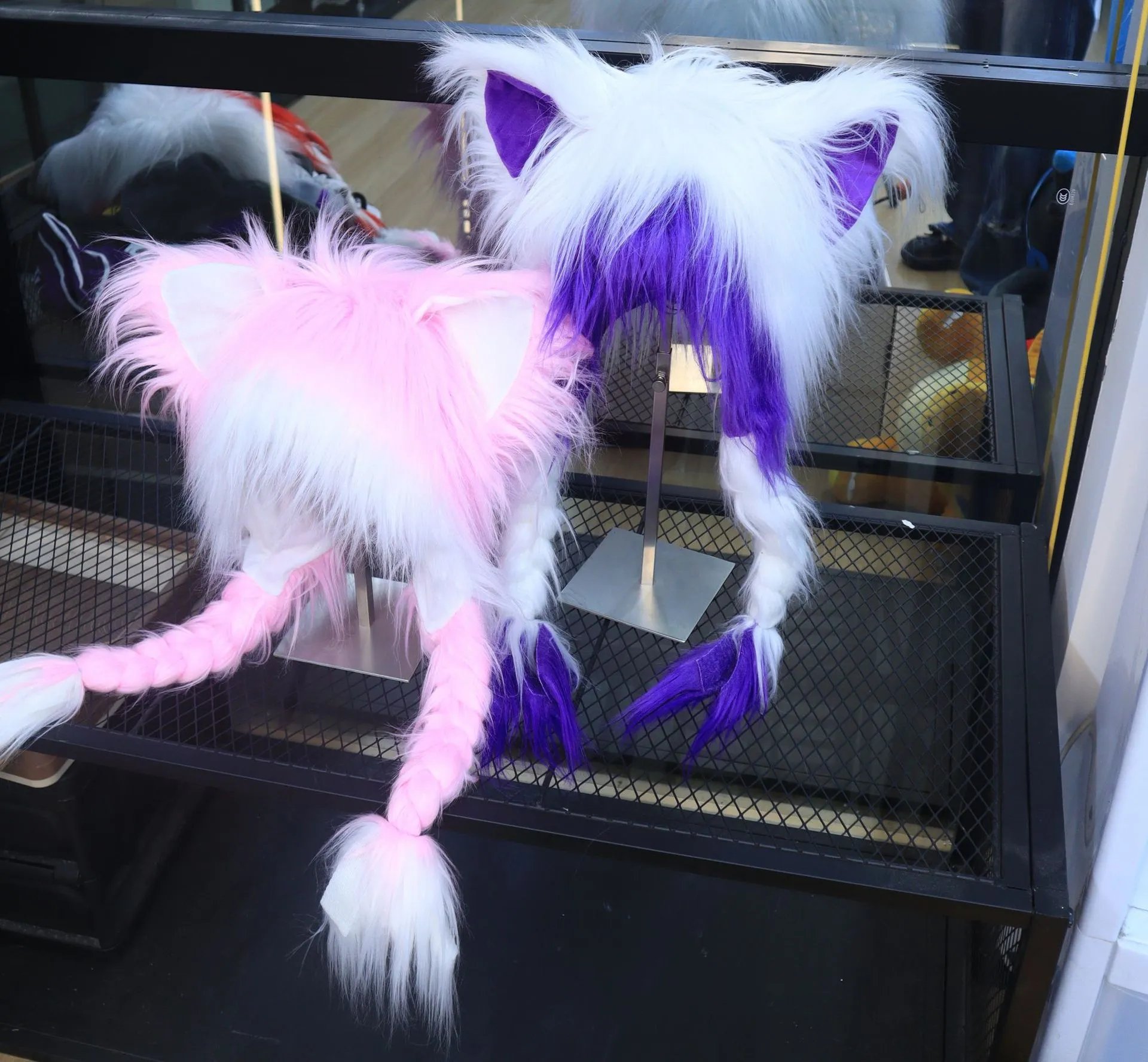 Pink and purple fuzzy animal ear hats