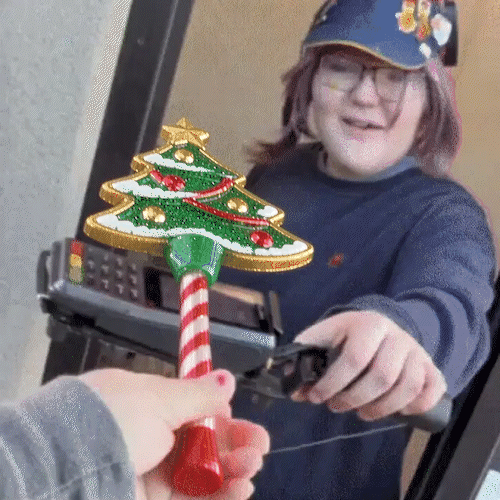Christmas tree payment wand creating a fun checkout reaction