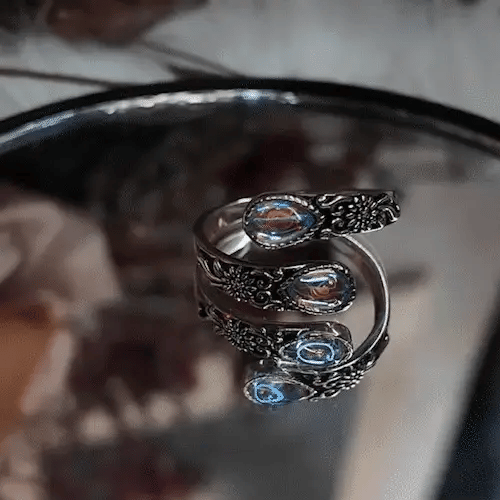 Moonstone Bloom Ring glowing blue shimmer vintage style