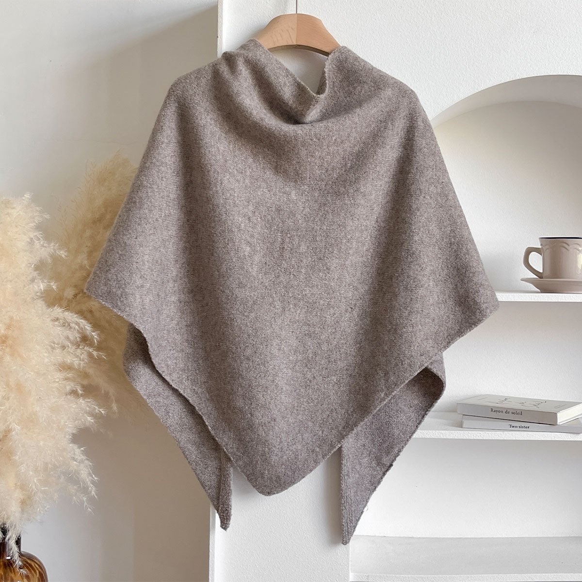 Taupe shawl draped open, showing its triangular shape and softly falling sides