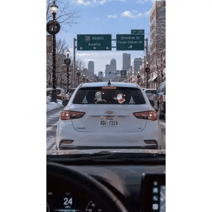 DrivePixel rear window display on a winter city street