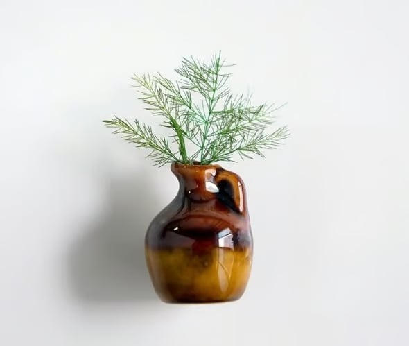 mini vase magnet holds tiny flowers