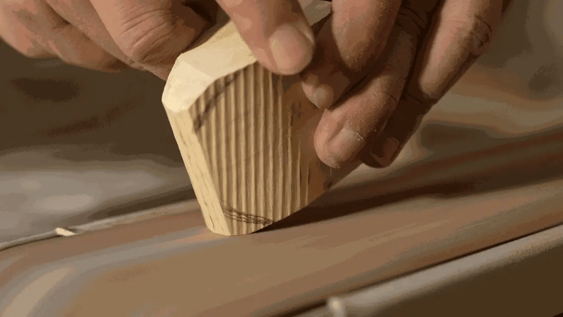 Sanding handcrafted wooden automaton