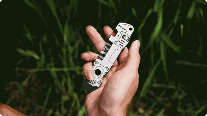 TC4 Titanium multi-tool being handled and demonstrated