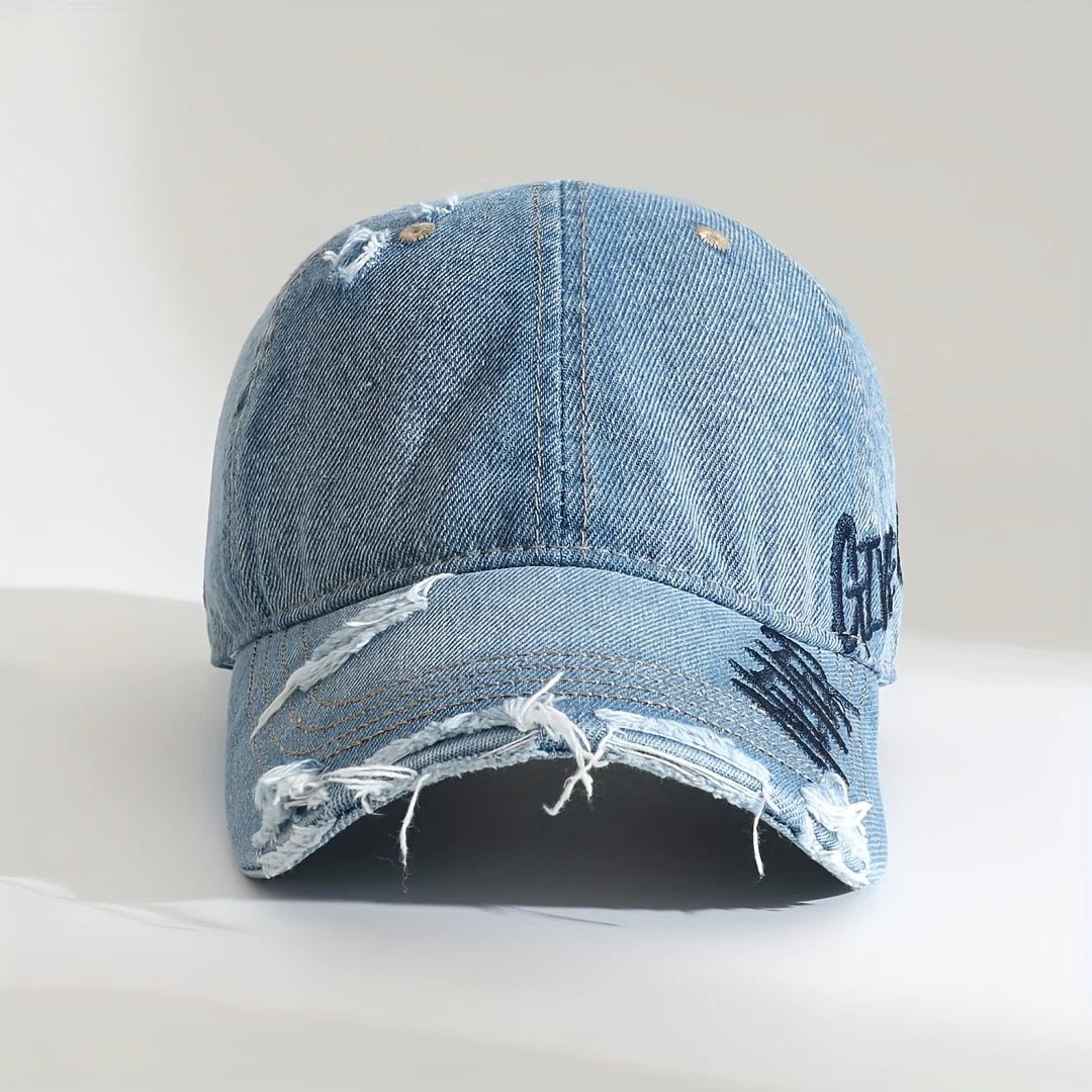 Close-up of distressed cap brim and embroidery