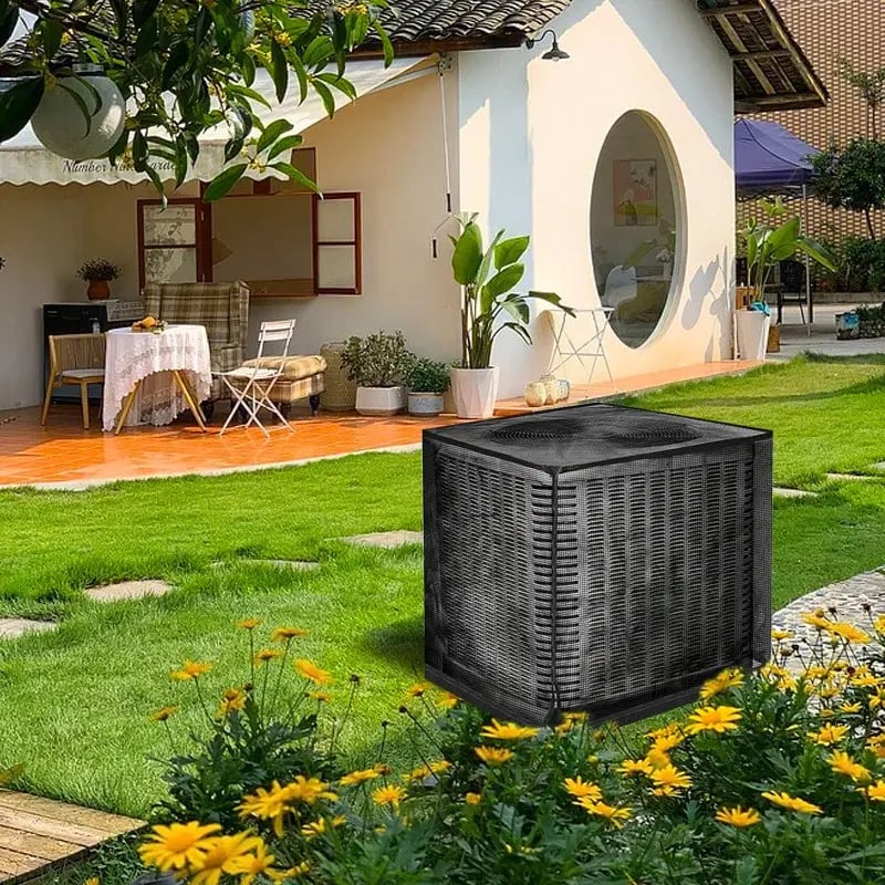 Heavy duty mesh AC cover protecting an outdoor air conditioner