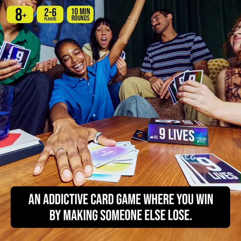 Family and friends playing 9 Lives card game together