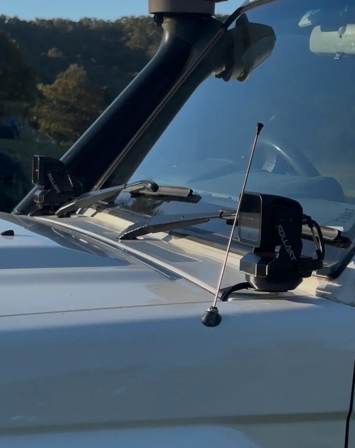 Spotlight mounted on work vehicle