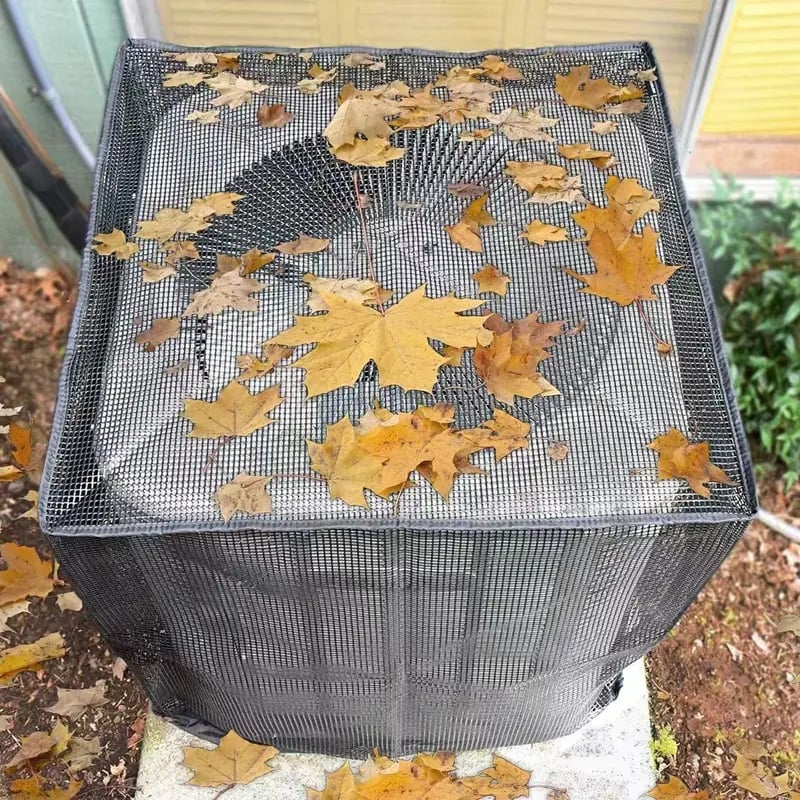 Mesh air conditioner cover catching fallen leaves